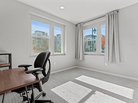 Bedroom/office #1 on the ground floor with private bathroom and closet