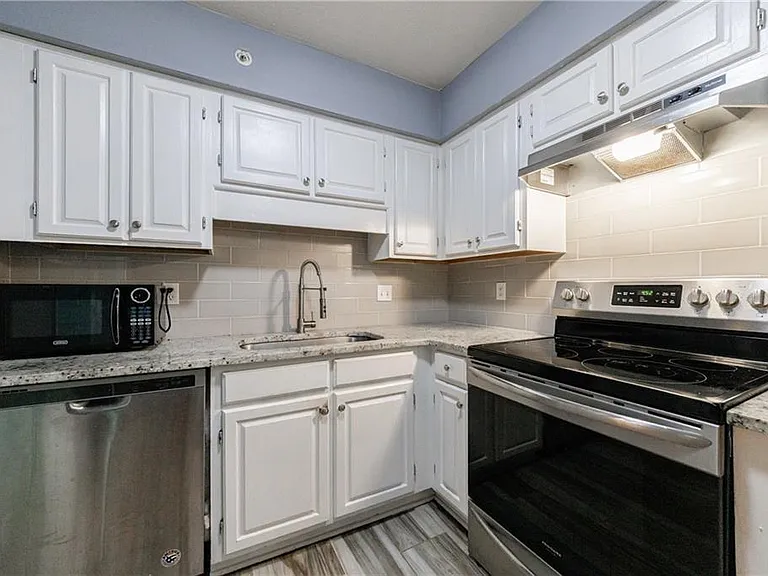 27306 Plantation Dr NE #306 — Photo 42