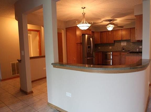 5th image of 6450 W Berteau Ave APT 407