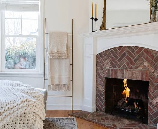 Gas powered fireplace in entry room