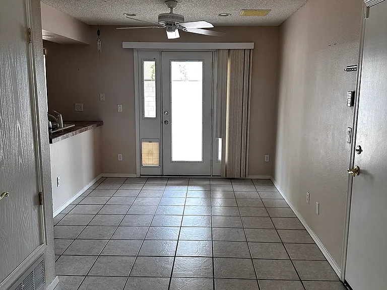Dining area, looking at back door with available doggy door