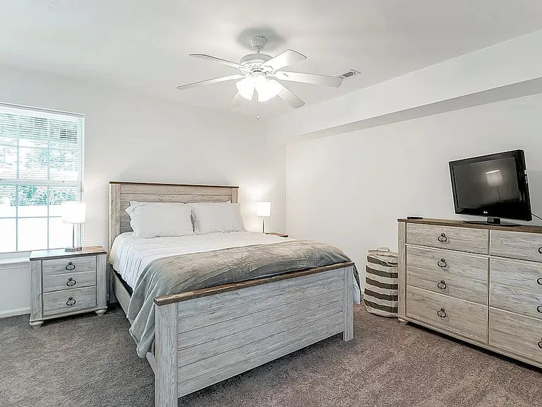 Bedroom 2: Features a cozy queen size bed & dressers for plenty of storage space to make yourself right at home.