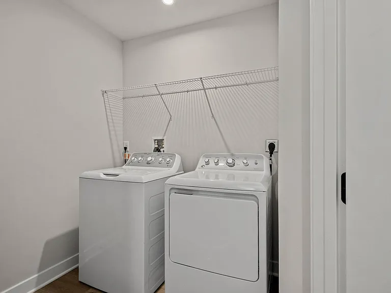 Second floor laundry with linen closet