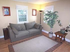Sunny family room located off the kitchen.