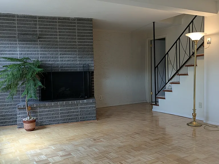 Downstairs living room with fireplace.