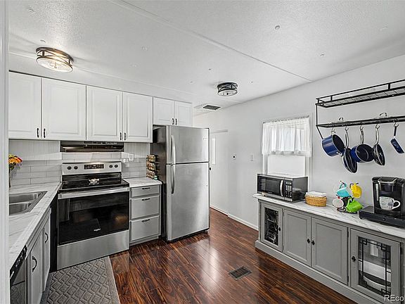 2nd image of 8201 S Santa Fe Drive LOT 153