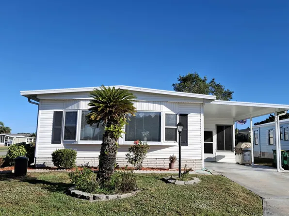 903 Thrush Cir, Barefoot Bay, FL 32976