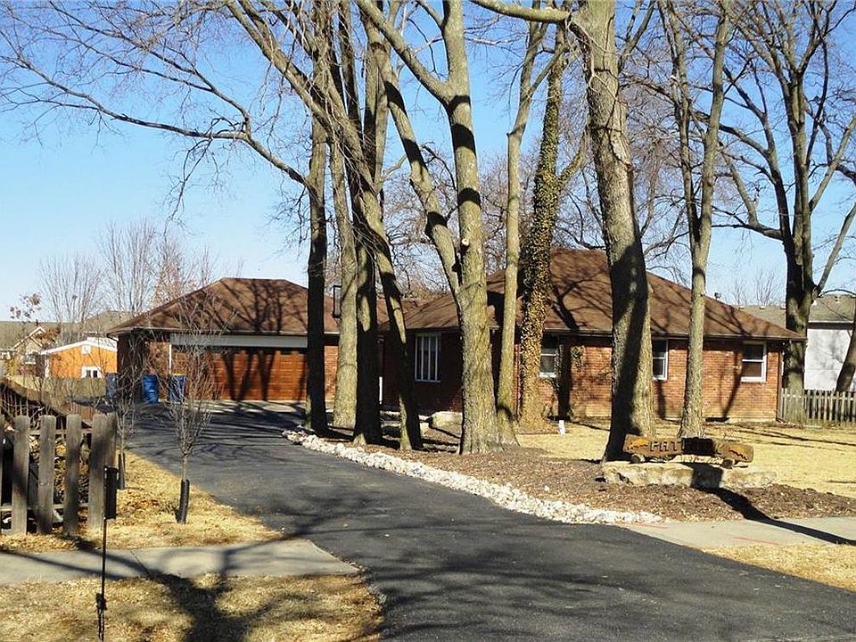 All brick ranch on a secluded treed lot.