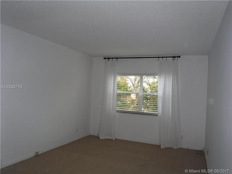 1st image of 100 Edgewater Dr APT 233