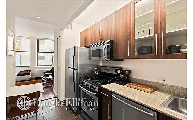 Sold by Douglas Elliman | media 13
