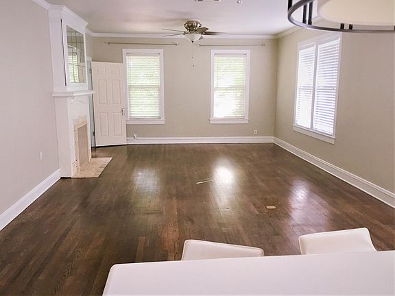 Sunny Living room up in the trees. Bunk room for guest through the door to the left.