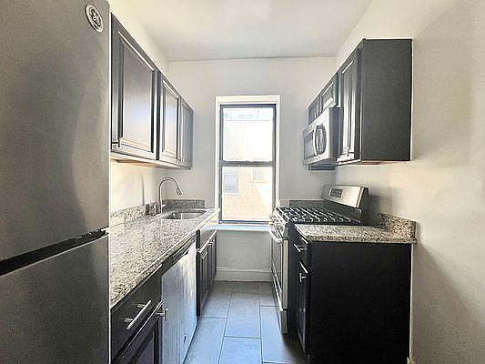 5th image of 10243 Corona Ave APT L4a