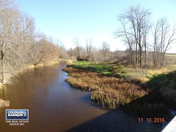 Branch Rvr runs along lot Line