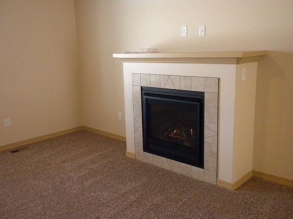 gas burning fireplace in living room