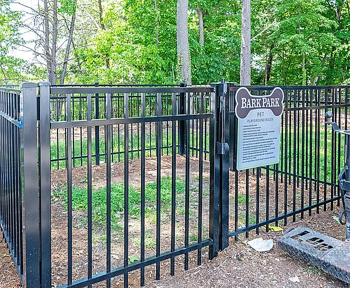 Explore a pet's paradise with this secure and inviting Bark Park area for playful moments.