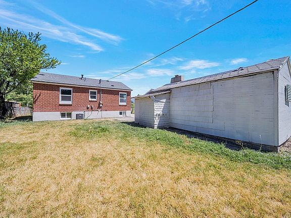 Large fenced backyard.