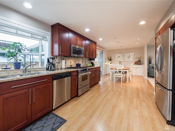 Spacious kitchen with stainless appliances