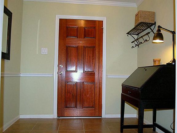 Wide Foyer greets guest and family with cheer.