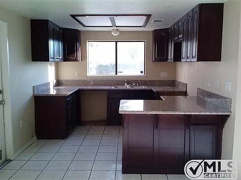 4th image of 10916 Santa Fe Ave