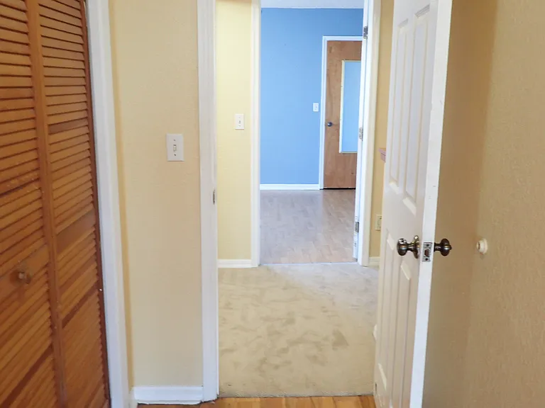 MASTER BEDROOM LOOKING INTO 3RD BEDROOM