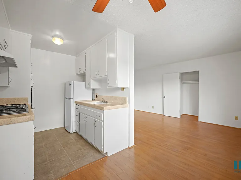 Kitchen with Refrigerator, Range Stove, and Oven
