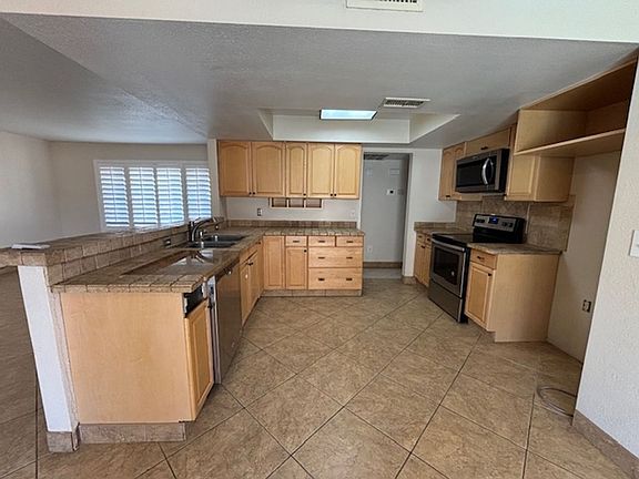 5th image of 1120 Feather Palm Dr