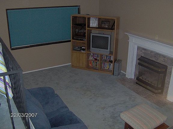 Formal Living room with marble fireplace