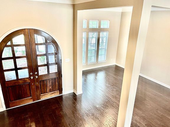 another view of the entrance and formal dining room