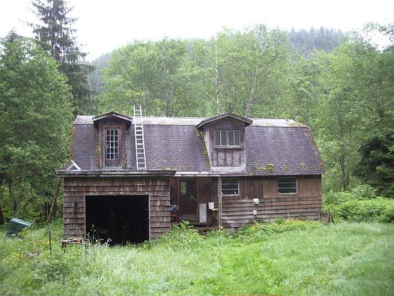 looking east from tree line that screens the road