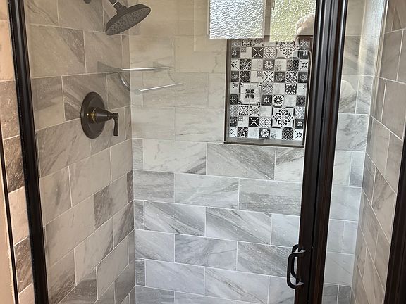 Master ensuite bathroom with shower