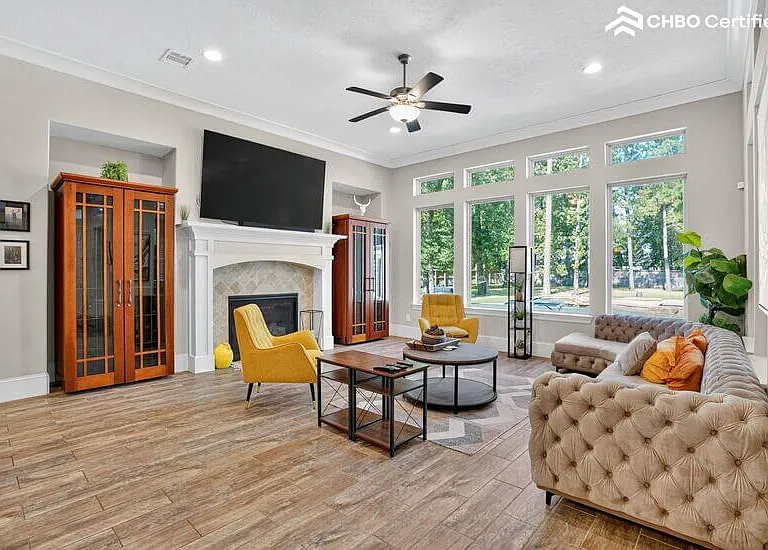 Cozy living room with fireplace and Wine Chillers