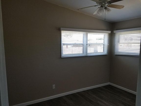 New Vinyl Floors, Vinyl Windows, Ceiling Fan and Custom Blin