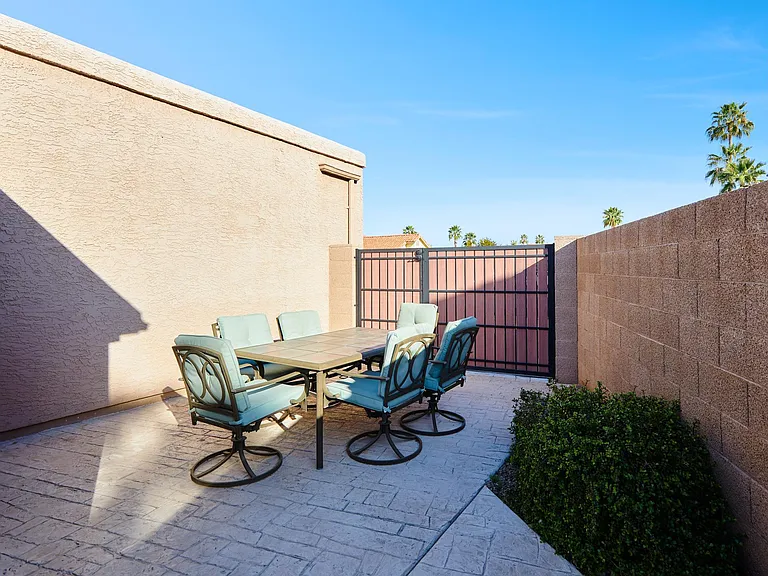 Bedroom 4 opens to this outdoor dining area (behind RV gate)