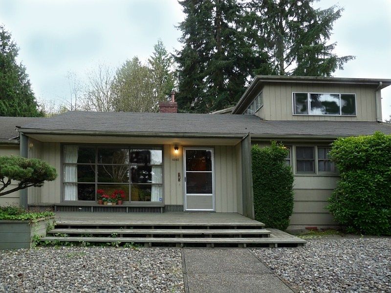 Original house built in 1950. Decor is Circa 1970's Located on a dead end, tree lined street in Wedgwood. This property backs to Inverness Ravine greenbelt. Close to shopping and restaurants