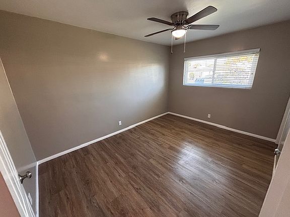 First bedroom with bath and ceiling fan