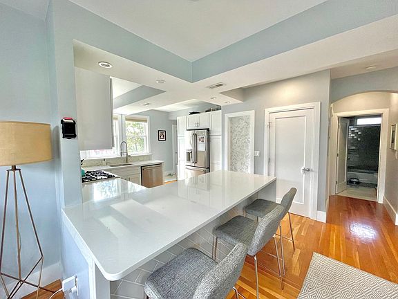 Bar seating, open layout to living room & dining room