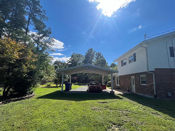 Open backyard ft. covered parking for up to two cars