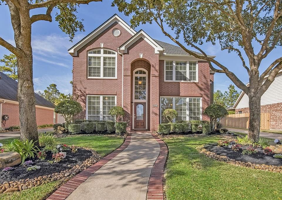 Welcome home to 13831 Sherburn Manor!