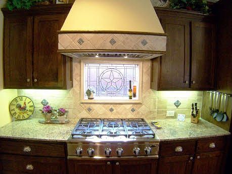 kitchen has SSL appliances, dble oven, & this new Fisher & Paykel DSC gas stov