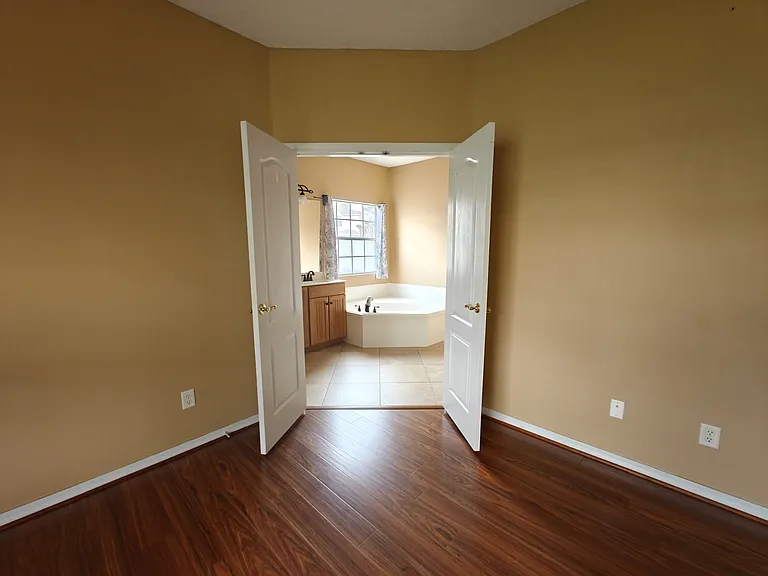 Master Bedroom to the Master Bathroom