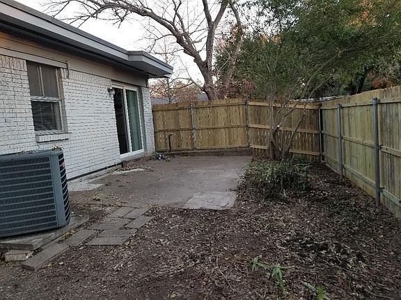 Patio with new fence off dining room. side yard