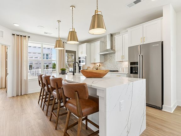 Spacious Gourmet Kitchen with Access to the Deck - Model Representation