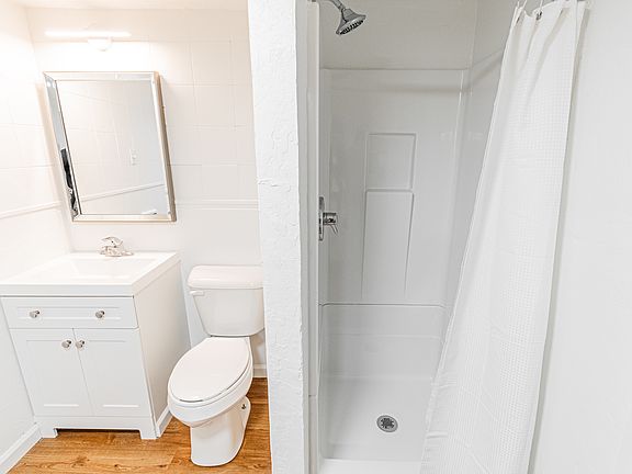 Updated bathroom with new floor and vanity