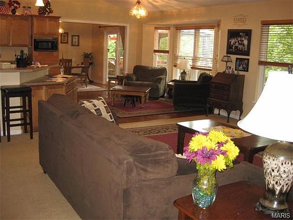 Open floor plan showing great room, breakfast room area, kitchen and dining room.