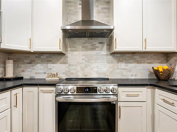 5th image of 2670 Carambola Cir N #1754