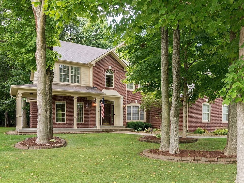 BEAUTIFUL CUSTOM HOME ON CORNER LOT WITH MATURE TREES!