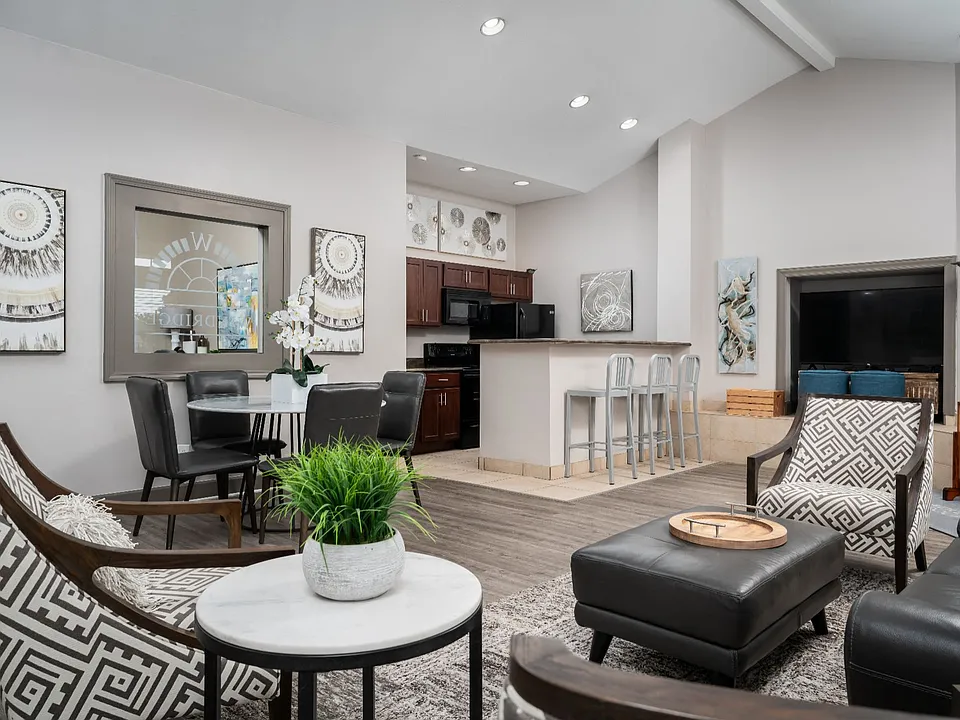 Step inside our welcoming clubhouse, featuring a cozy lounge area, dining space, and fully equipped kitchen.