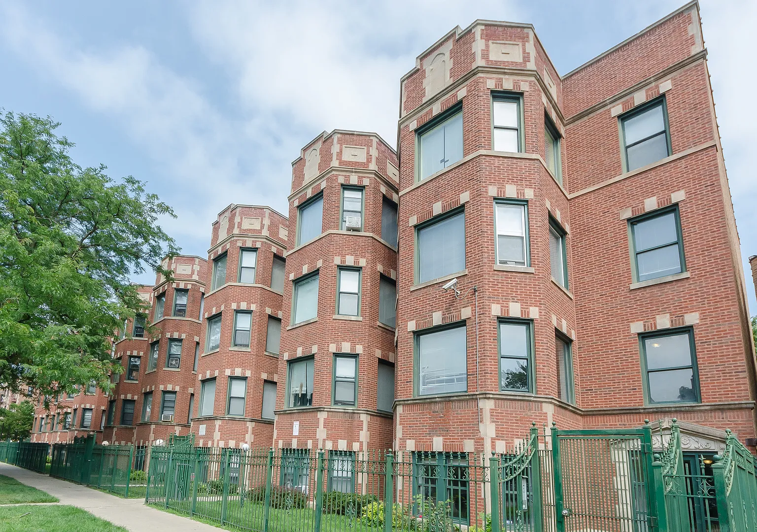 6901-17 S. Paxton/2211-17 E 69th St. — Photo 1