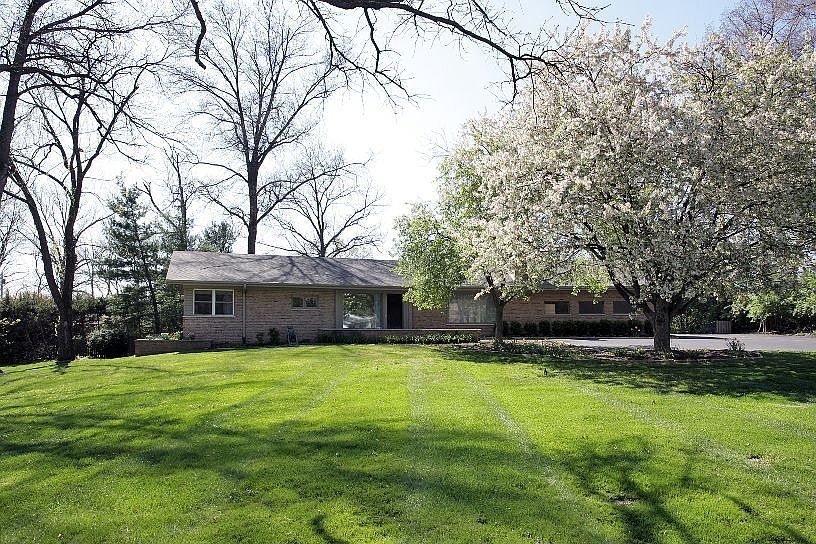 Updated Brick Ranch on Beautiful Acre Lot in Prime Location