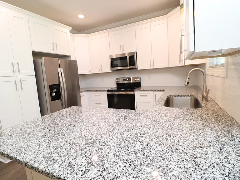 8424 Rhodes Rd — Photo 10